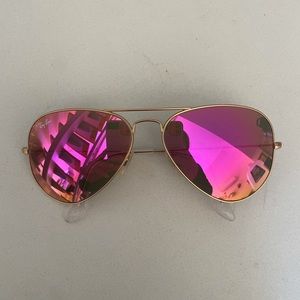 Ray Ban sunglasses with pink reflective lenses. Very lightly used.